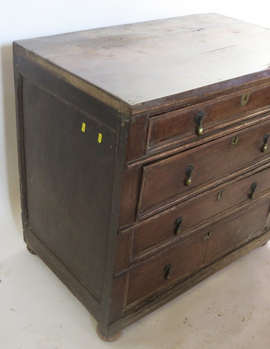 An Antique oak chest, of four long graduated drawers, with moulded fronts, width 36.5ins, height - Image 4 of 4