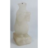 A carved alabaster model, of a begging bear, on a plinth base fitted with a light fitting, height
