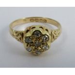 A seven stone diamond 18 carat gold ring, set with old single cuts, finger size Q 1/2, 3.3g gross