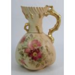 A Royal Worcester blush ivory quarter lobed coral jug, decorated with flowers, shape number 1507,