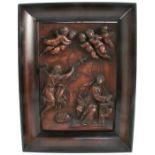 A pair of framed Black Forest wooden panels, carved in relief with religious figures, 10.5ins x 7.