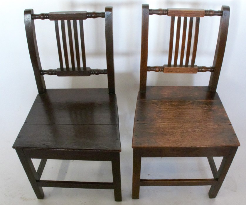 A set of four 19th century oak dining chairs, with carved and slat backs over solid seats - Image 2 of 2