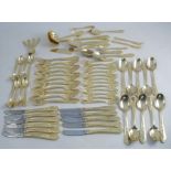 A canteen of continental style gold plated cutlery, approximately 68 pieces