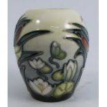 A Moorcroft pottery vase, decorated in the Lamia pattern, height 3.75insCondition Report: