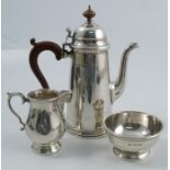 A three piece coffee set, comprising coffee pot, sugar bowl and milk jug, Birmingham 1960, maker
