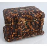 A Victorian tortoiseshell tea caddy, with serpentine front, the interior fitted with two covered