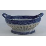 A 19th century pearlware pierced basket, of oval form, decorated in a printed blue and white