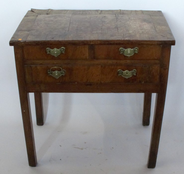 A 19th century mahogany low boy, fitted with two short over one long drawer, raised on square