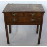 A 19th century mahogany low boy, fitted with two short over one long drawer, raised on square
