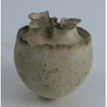 Deirdre Burnett, a small porcelain vase with crimped quarter-lobed neck, impressed DB, height 3.