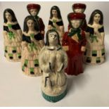 Eight various candle snuffers, to include Lady Motorist, four Girls in Crinoline dress and a praying