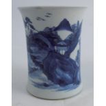 A Kangxi porcelain vase, with flared rim, decorated in blue and white with a figure in a boat on a