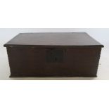An Antique oak bible box, with carved decoration to the front, 25ins x 17ins x 9.5ins