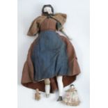 A Victorian porcelain shoulder head doll, impressed 18, with bisque lower limbs, af, together with a