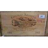 A case of 12 bottles of Chateau Arnauld 2002