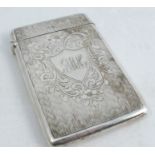 A silver card case, of rectangular form, with engraved decoration and initials, Birmingham 1907,