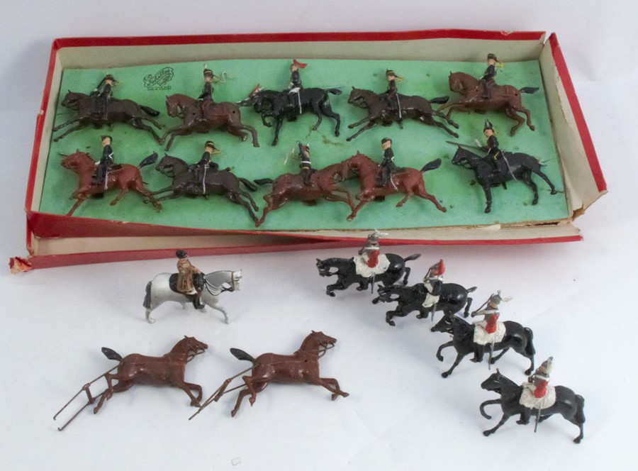 A collection of painted lead models, of soldiers on horse back