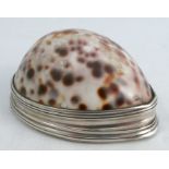 An 18th century silver mounted cowrie shell snuff box, with engraving to the hinge, makers mark I.