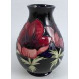 A Moorcroft pottery baluster vase, decorated in the Anemone pattern, height 7.75insCondition Report: