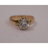 A diamond single stone ring, inscribed for 1881, the old brilliant cut, measuring approximately 7.
