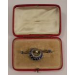 A late Victorian diamond, sapphire and pearl bar brooch, the central pearl (untested and