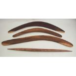 Three Australian hardwood boomerangs, together with a stick