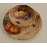 A Royal Worcester miniature tea cup and saucer, decorated with hand painted fruit by William