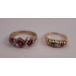 A ruby and diamond dress ring, unmarked, the three graduated rubies with four rows of small
