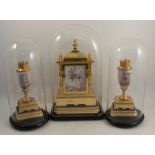 A 19th century French clock garniture by Japy Freres, comprising a central clock decorated with a