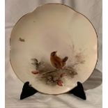 A Royal Worcester plate, decorated with a wren by James Stinton, circa 1912, diameter 8.