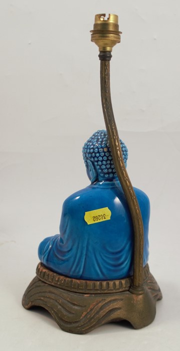 A table lamp, formed as a blue seated oriental deity, raised on a wooden base, height 13insCondition - Image 2 of 2
