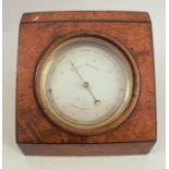 An 18th century aneroid table barometer, by Dixey, New Bond Street, London, in a fitted burr wood