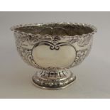 A silver pedestal bowl, with embossed decoration, Sheffield 1901, maker Henry Atkin, weight 10oz