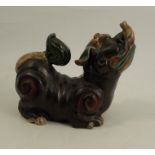 A stoneware model, of a dog of fo, length 8ins, height 7ins, afCondition Report: Both tongue and
