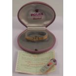 A ladies 18ct gold Rolex Orchid wrist watch, with textured strap, marked 750, with original box