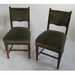 A set of six Edwardian oak dining chairs, with moulded sides, and cotton reel turned legs united