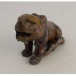 An Oriental polished stone model, of a seated tiger, length 5.5ins