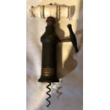 A bone and metal corkscrew, by Joseph Rogers and Sons, SheffieldCondition Report: The handle is