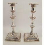 A pair of 19th century old Sheffield plate candlesticks, with wrythen decoration, multi knop