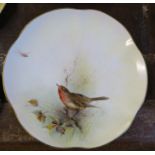 A Royal Worcester plate, decorated with a robin by James Stinton, circa 1912, diameter 8.