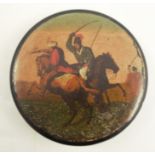 A 19th century papier mache snuff box, of circular form, the top decorated with a battle scene,