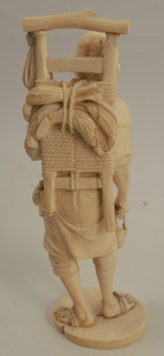 A 19th century carved ivory figure, of an Eastern man with harvested crops on his back, signed to - Image 4 of 6