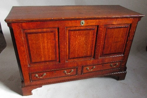 An Antique oak mule chest, with rising lid over a three panelled front and two drawers, width 53. - Image 2 of 3