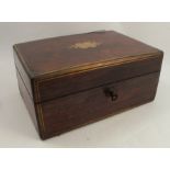 A 19th century rosewood gentleman's travelling vanity box, inset with brass, the interior fitted
