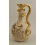 A 19th century Royal Worcester gilded ivory ewer, having lizard handle and decorated with shot