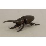 A modern Japanese style bronze model, of a beetle, signed, length 3.75ins