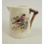A Royal Worcester rustic jug, decorated with a bullfinch by William Powell, 1935, height 2.
