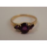 An amethyst and diamond dress ring, stamped '14k', finger size P, 2.4g gross