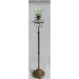 A 19th century floor standing telescopic Messenger Patent oil lamp, the brass stand with circular