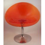 A 20th century chrome and orange perspex swivel chair, height approximately 38ins